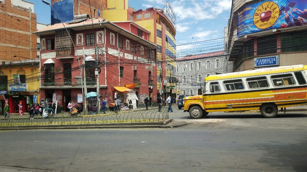 Buses rumble around the narrow streets